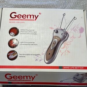 Geemy Rechargeable Hair Remover in Brown and Silver